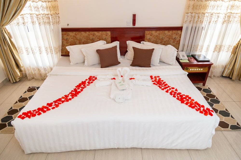 Фото Sunlodge Hotel