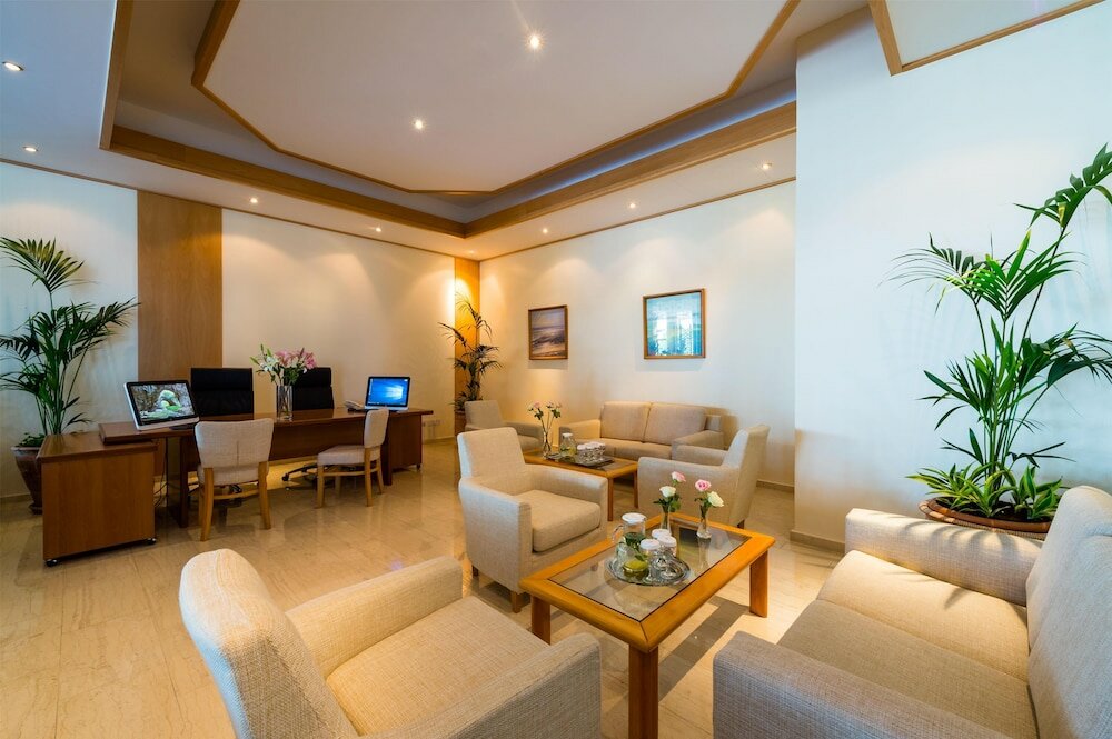 Фото Constantinou Bros Athena Royal Beach Hotel