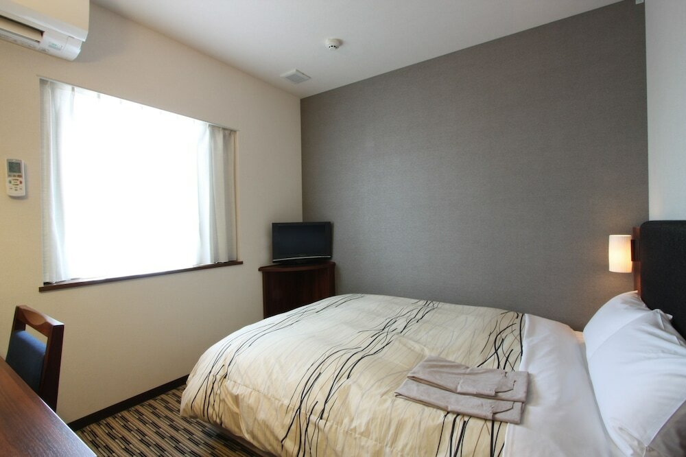 Фото Uozu Manten Hotel Ekimae