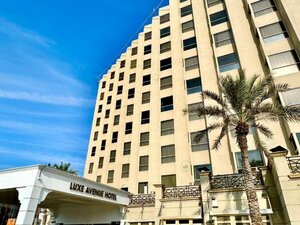 Гостиница Luxe Avenue Hotel
