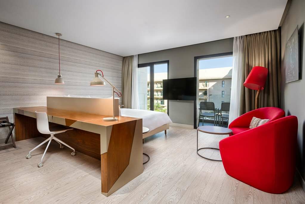 Фото Radisson Blu Hotel, Marrakech Carre Eden