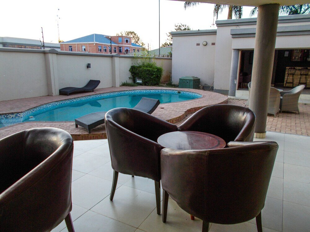 Фото Four Pillars Lodge