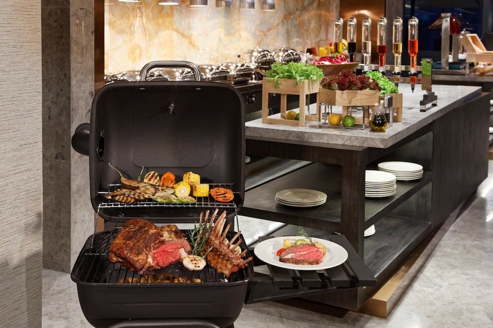 Фото Fraser Suites Dalian