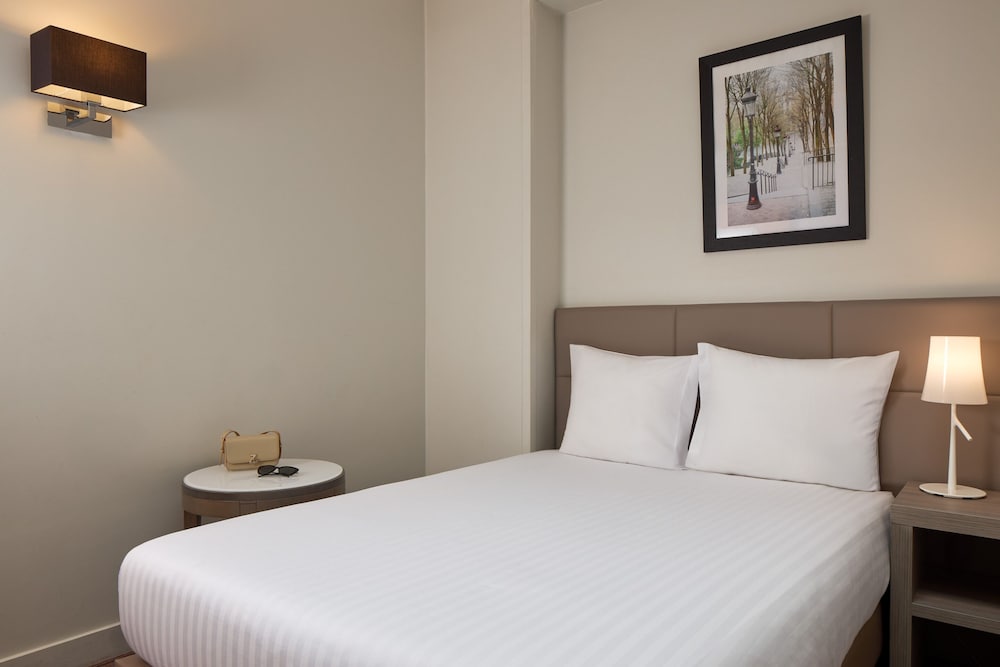 Фото Timhotel Opéra Blanche Fontaine