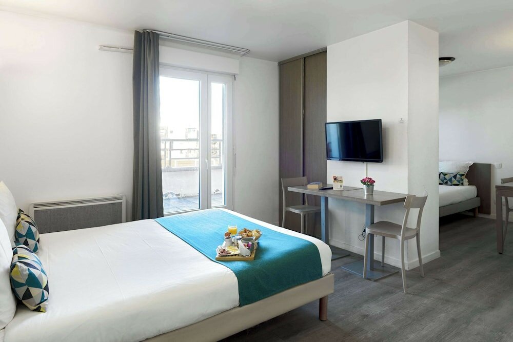 Фото Comfort Aparthotel Versailles Saint Cyr Lecole 