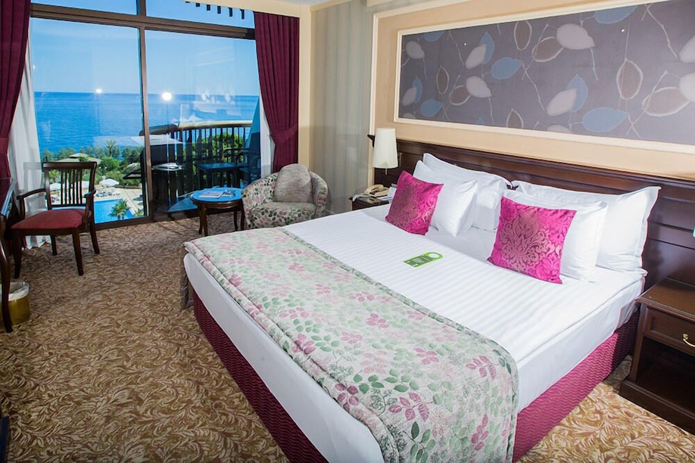 Фото Merit Crystal Cove Hotel