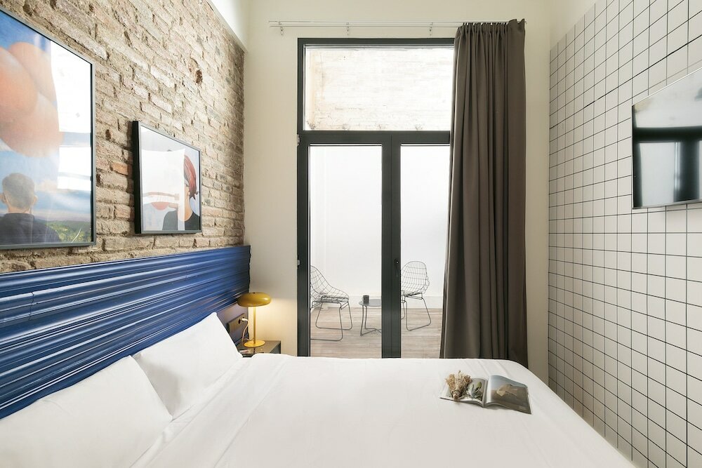 Фото Arte Suites by Olala Homes