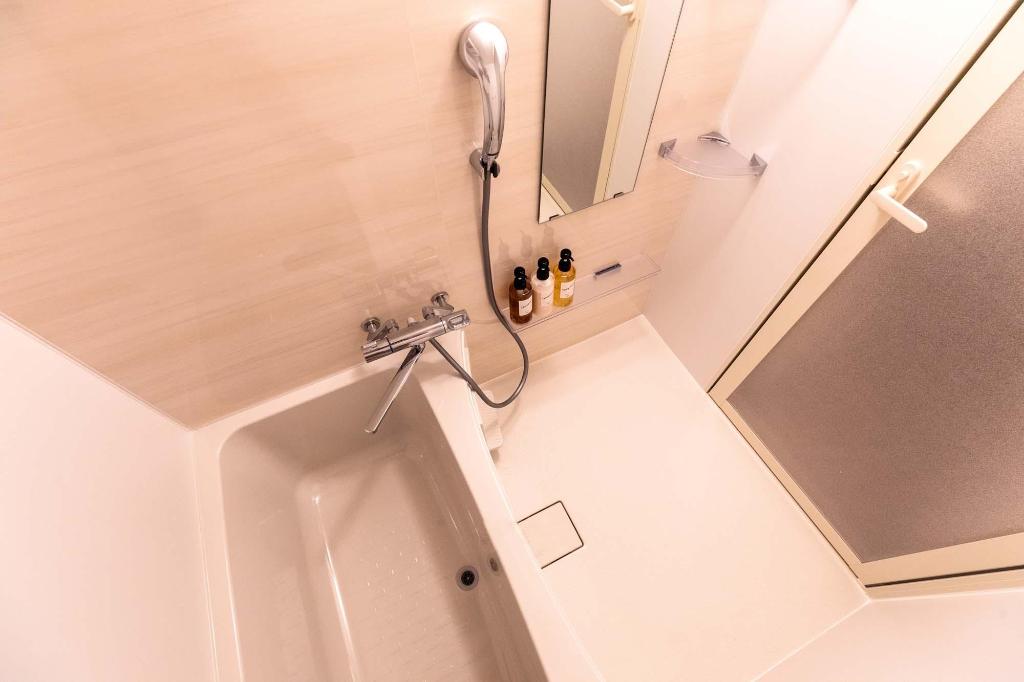 Фото Mr. Kinjo in front of Manza Beach