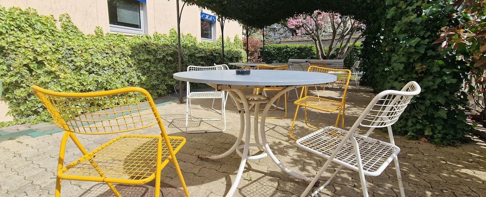 Фото Kyriad Direct Arpajon