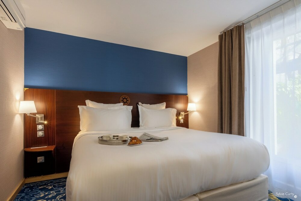 Фото Hôtel Le Yachtman, The Originals Collection