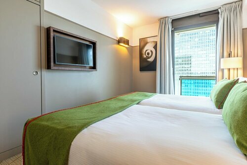 Гостиница Fraser Suites Harmonie Paris La Défense в Пюто