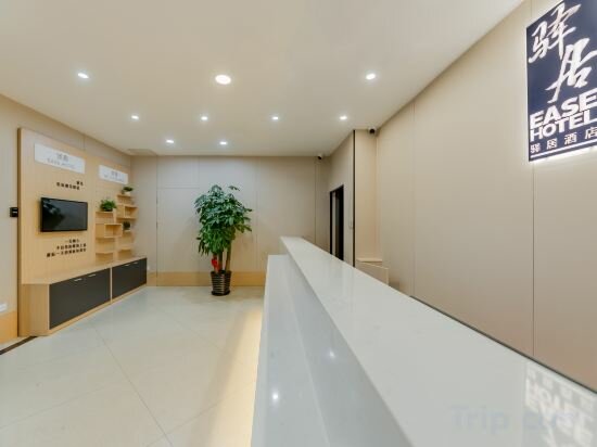 Фото Home Ease Hotel