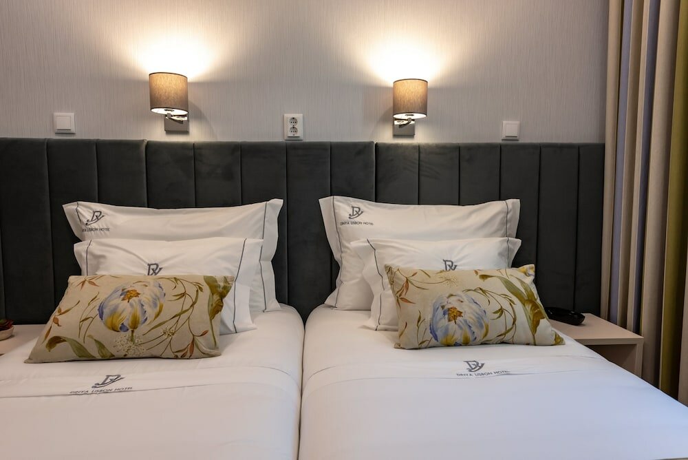 Фото Dinya Lisbon Hotel & Lounge Bar