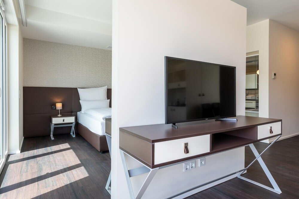 Фото Trip Inn Conference Hotel & Suites