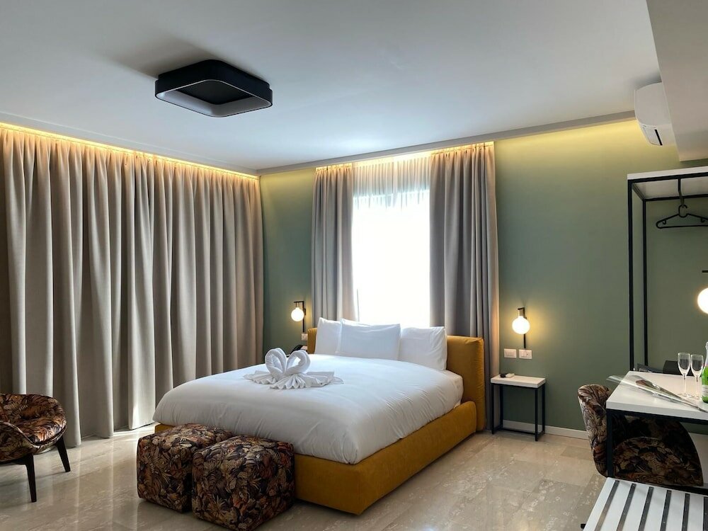 Фото Oasi Village Hotel