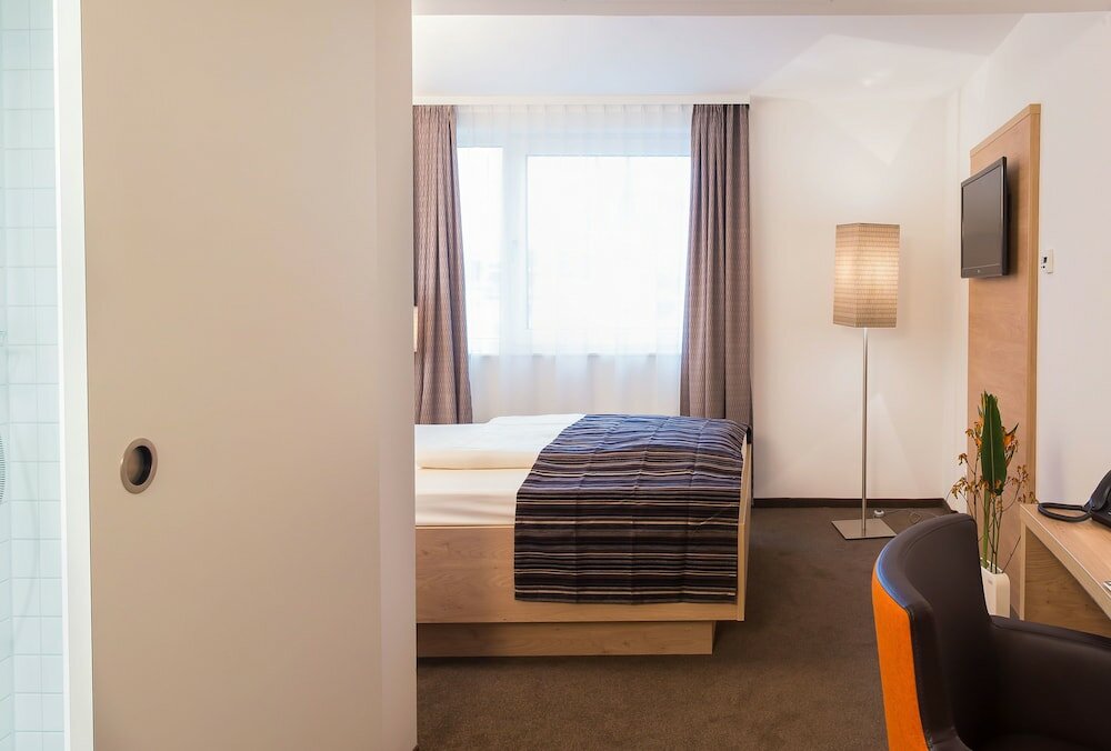 Фото Stadthotel am Römerturm