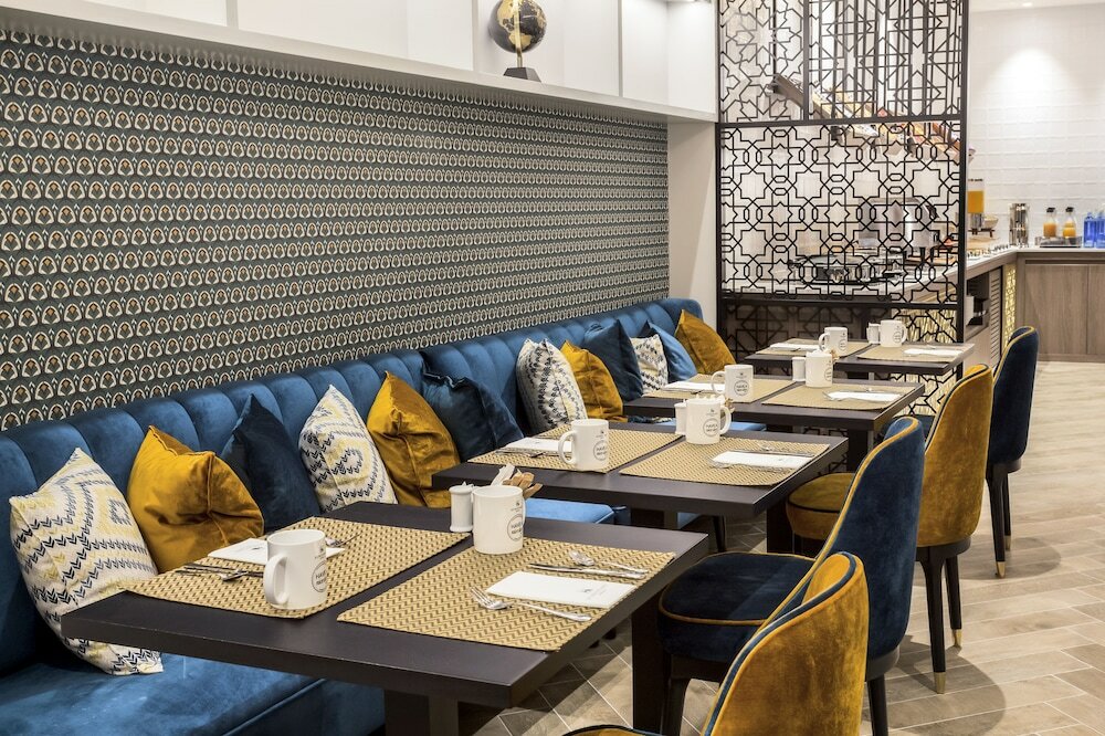 Фото Eurostars Puerta Real Hotel