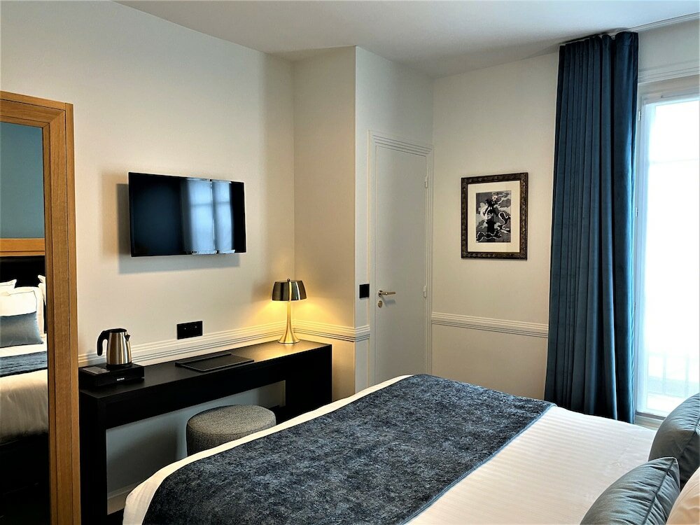 Фото Hôtel Le Cercle Tour Eiffel