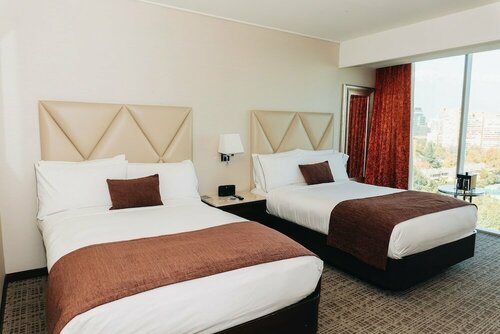 Внешний вид отеля Renaissance Santiago Hotel by Marriott в Витакуре, фото 3