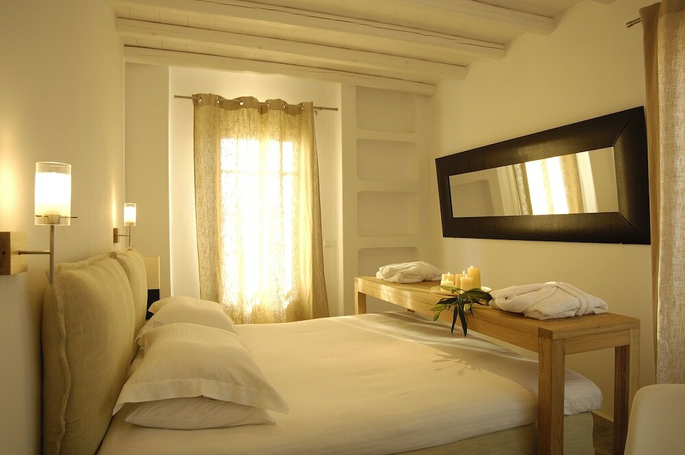 Фото Kapetan Tasos Suites