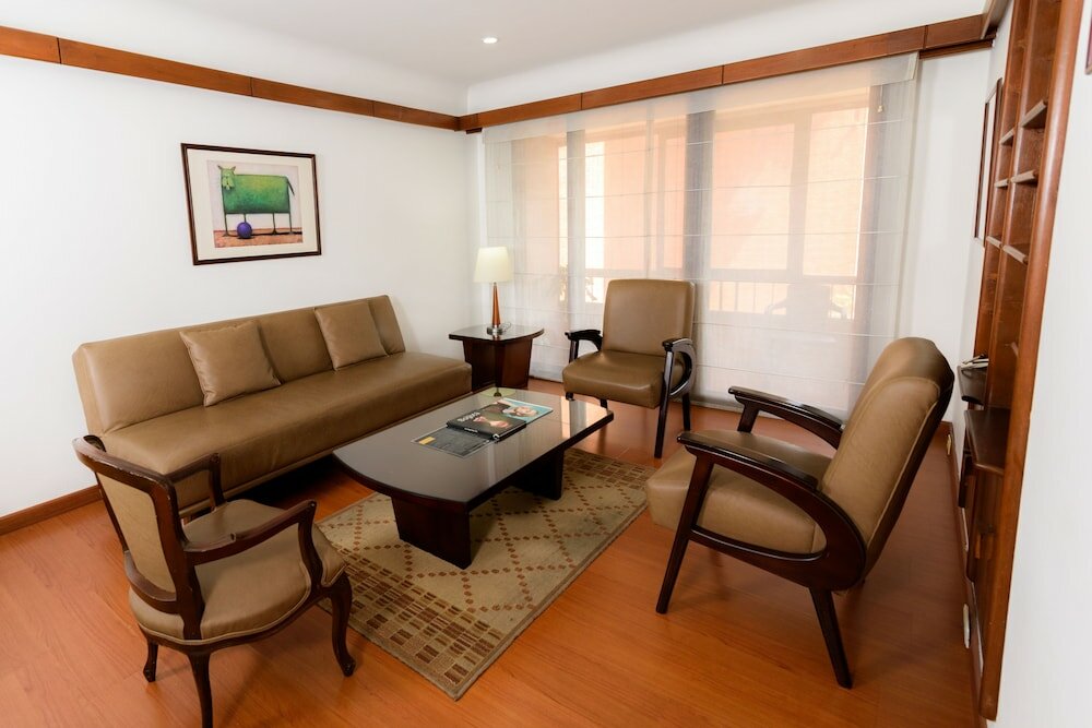 Фото Travelers Suites Condominio Plenitud