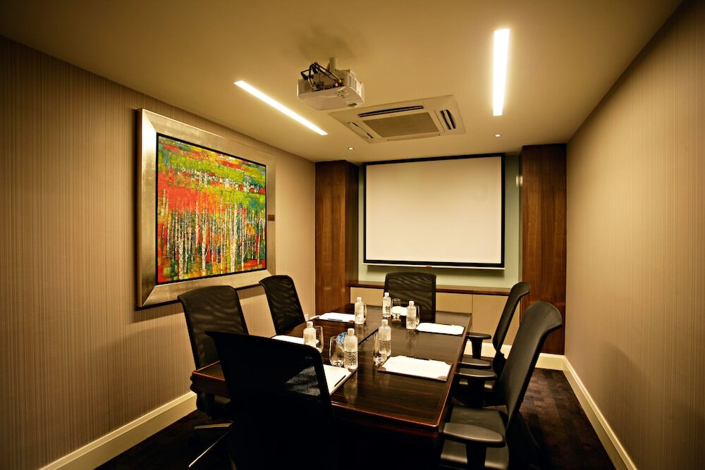 Фото Ascott Raffles Place Singapore