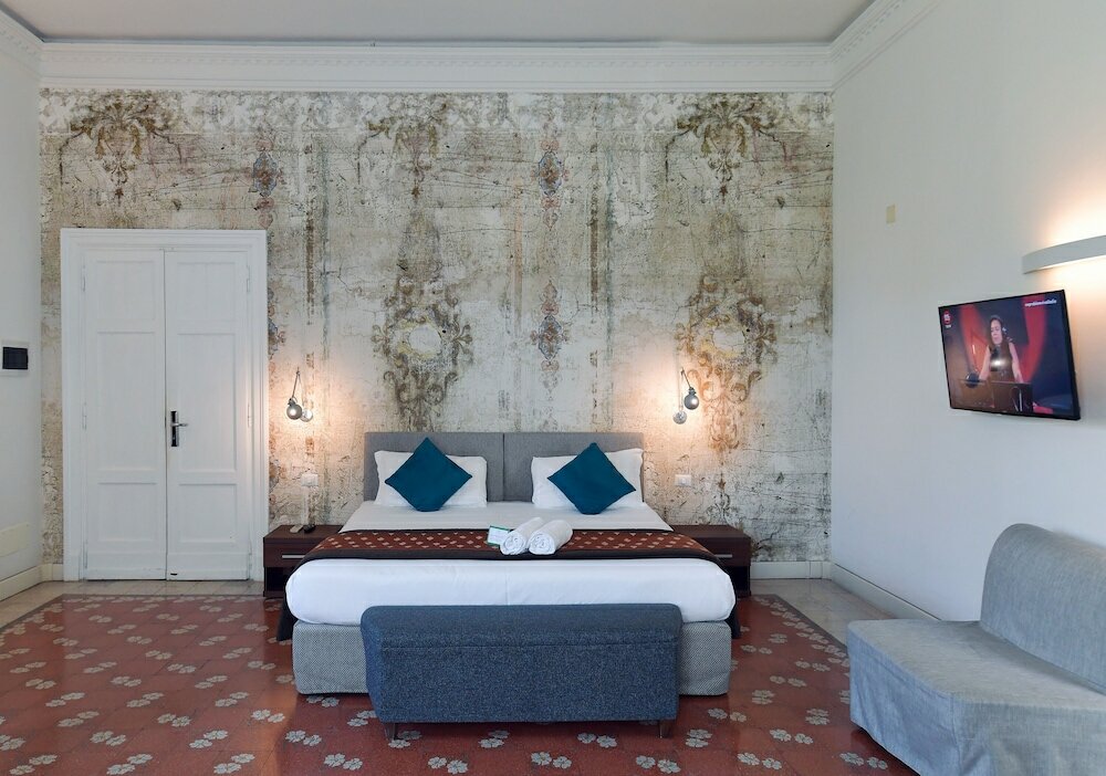 Фото Suites Farnese Design Hotel