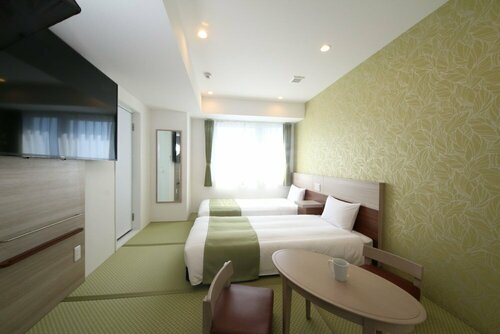 Гостиница Kuretake Inn Premium Numazu Kitaguchi Ekimae в Нумадзу