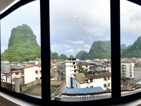 Фото Yangshuo Qingyunge Hotel