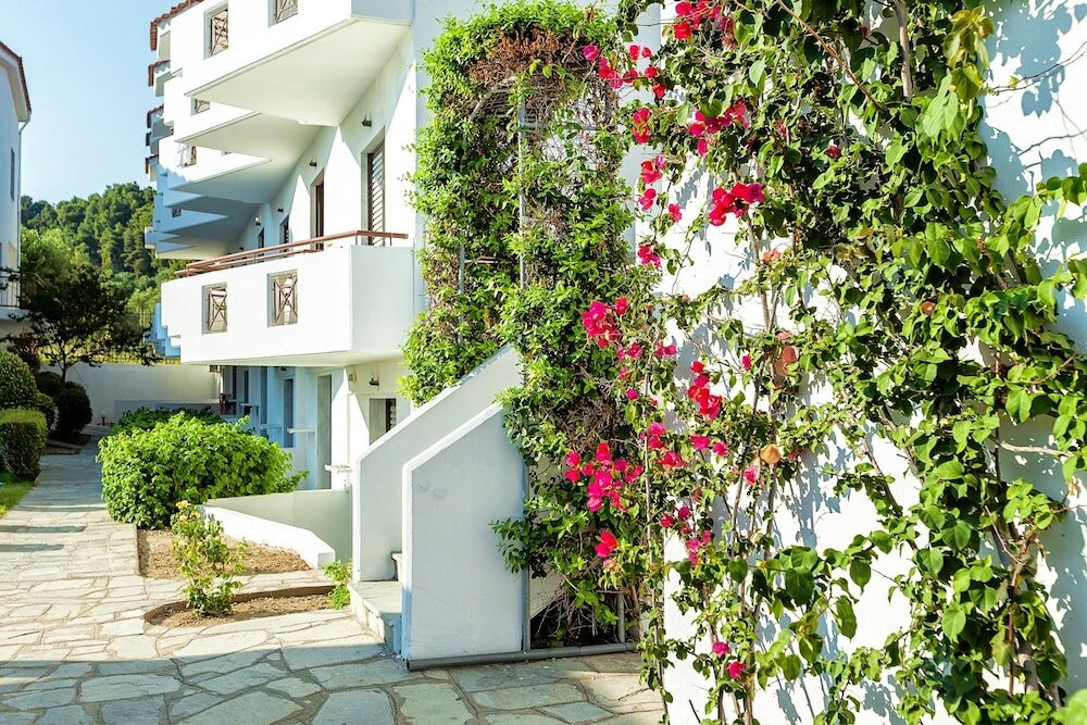 Фото Xenios Dolphin Beach Hotel