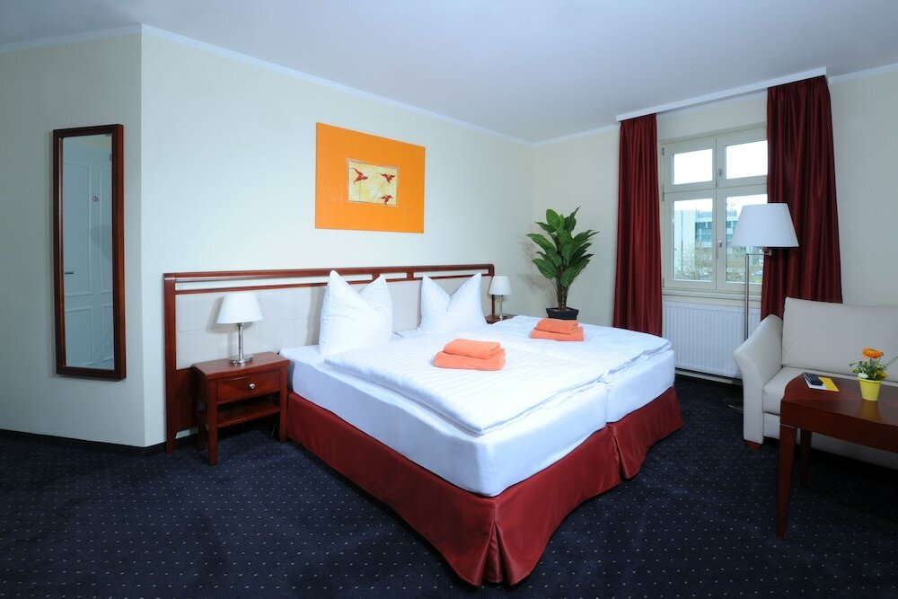 Фото AppartementHotel SchlafGut Leipzig