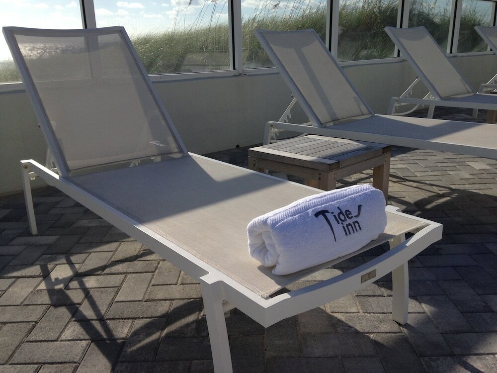 Фото Tides Inn Hotel