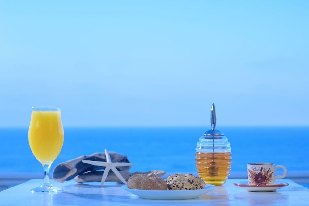 Фото Cavos Bay Hotel and Studios