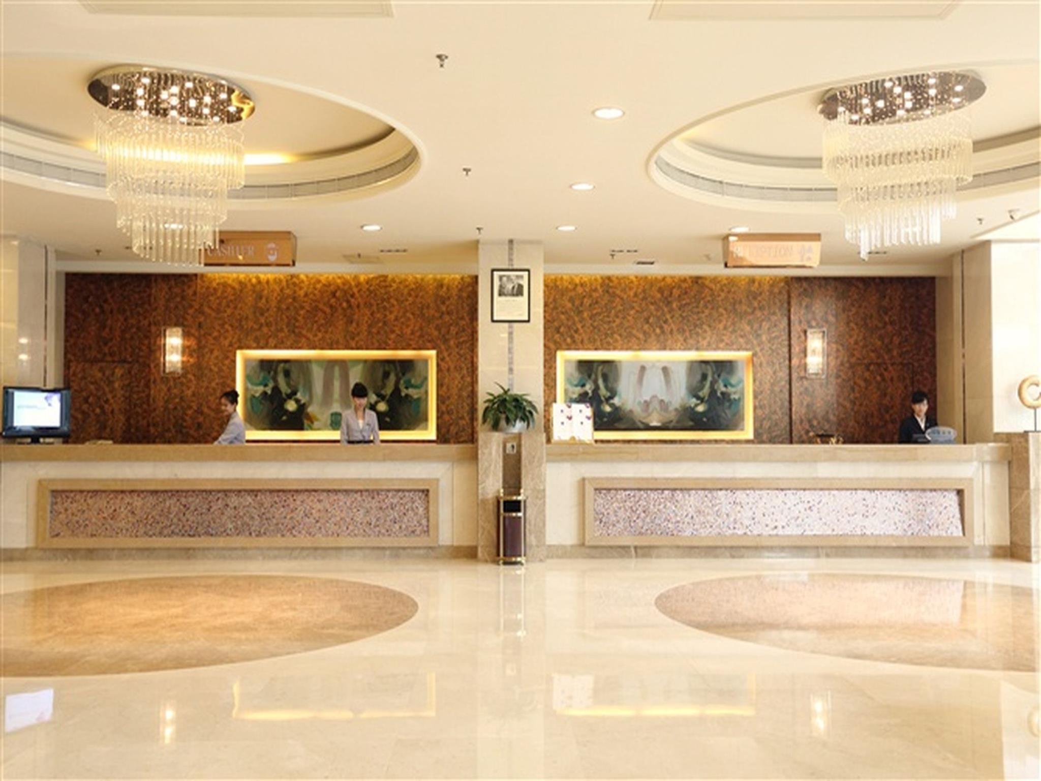 Фото Qingdao Kuaitong International Hotel