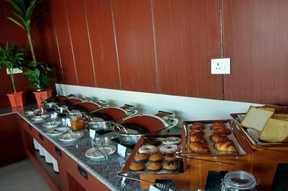 Фото Pushkara Sarovar Portico Dibrugarh