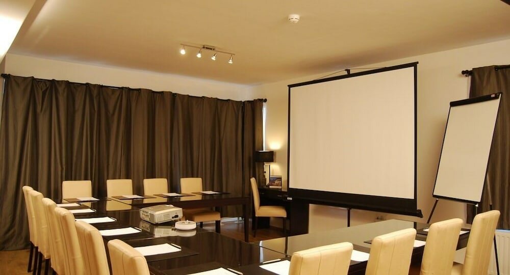 Фото Escala Hotel & Suites