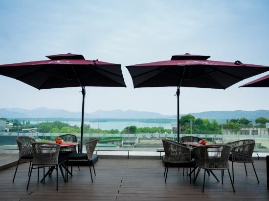 Фото Hangzhou West Lake Xinqiao Hotel