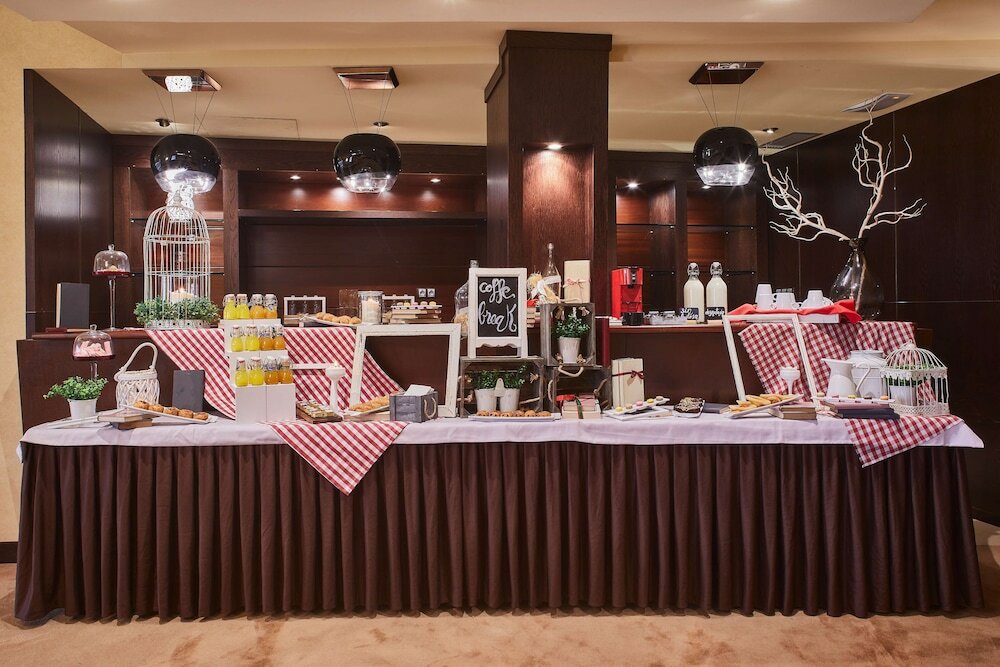 Фото Hotel Silken Ciudad Gijon