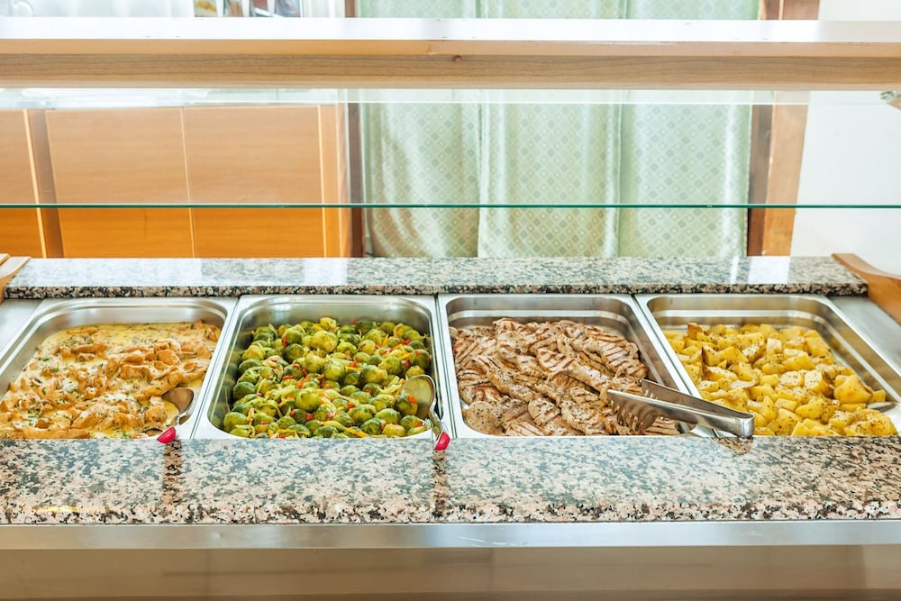 Фото Xenios Dolphin Beach Hotel