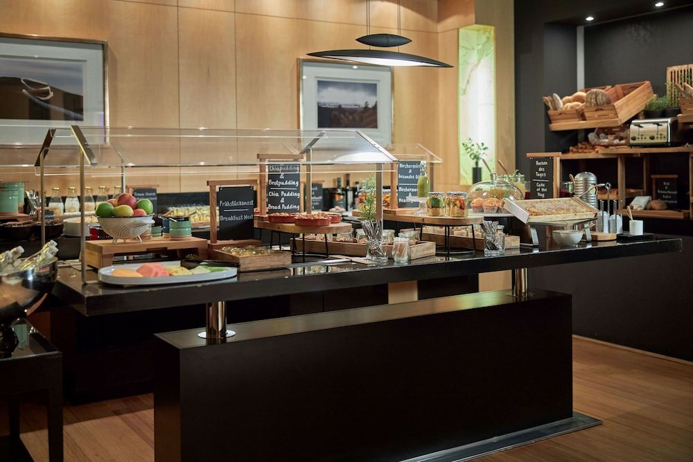 Фото Wasserturm Hotel Cologne, Curio Collection by Hilton