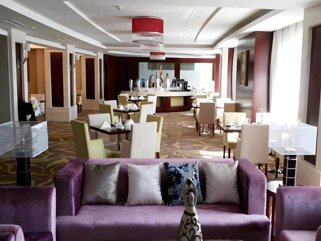 Фото Qingdao Huaxi Hotel