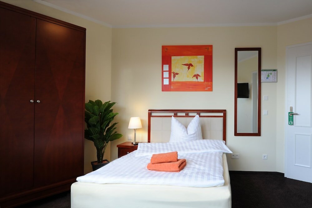 Фото AppartementHotel SchlafGut Leipzig