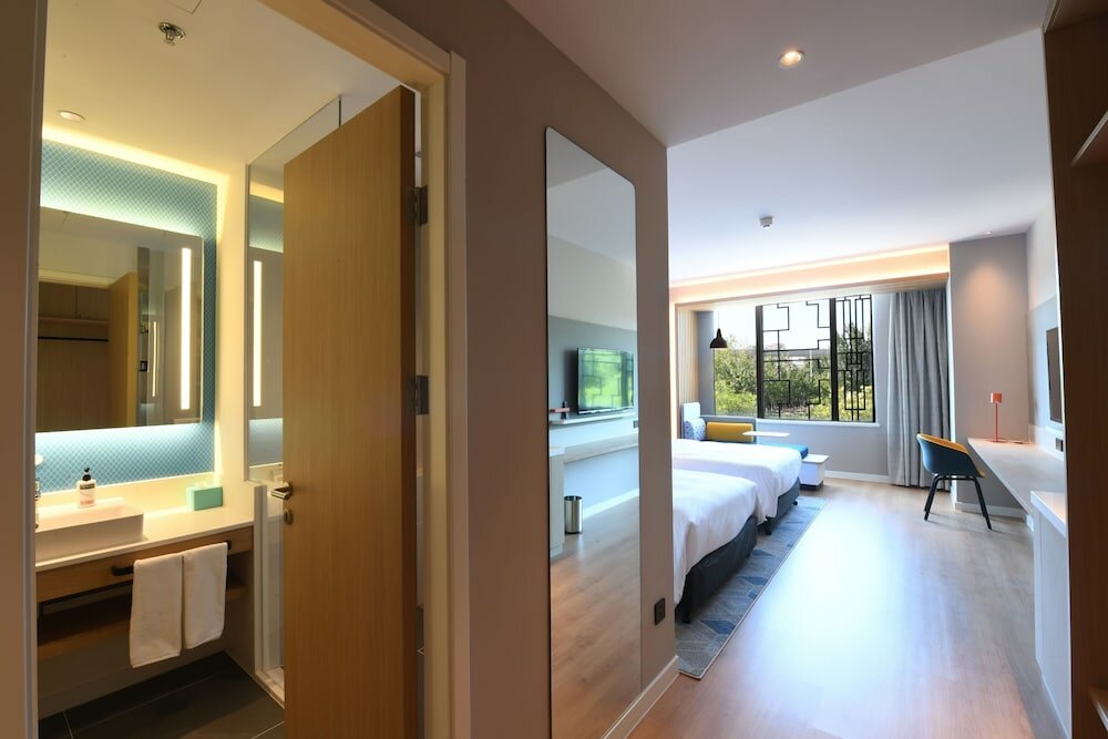 Фото Holiday Inn Express Tianjin Binhai, an Ihg Hotel