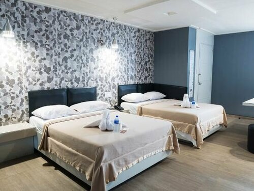 Внешний вид отеля New Winston Hotel в Пасае, фото 4