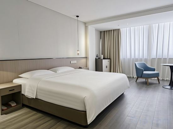 Фото Xinghua Hotel