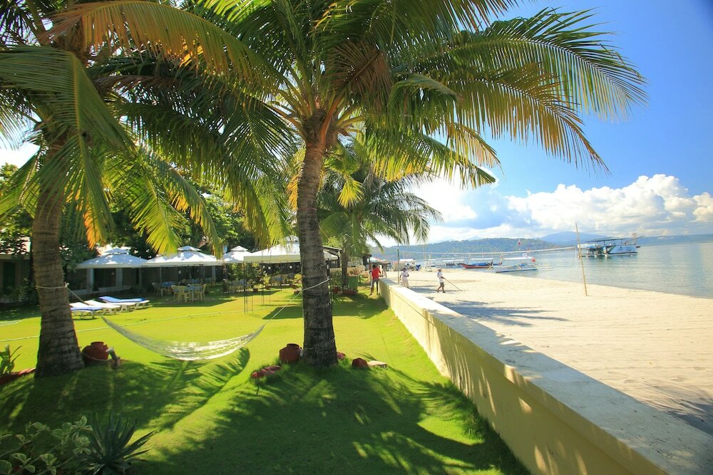 Фото Wild Orchid Beach Resort