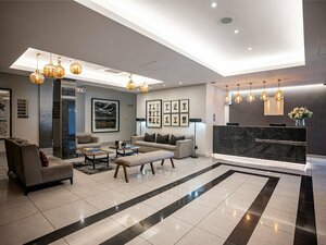 Гостиница Catalyst Apartment Hotel by Newmark
