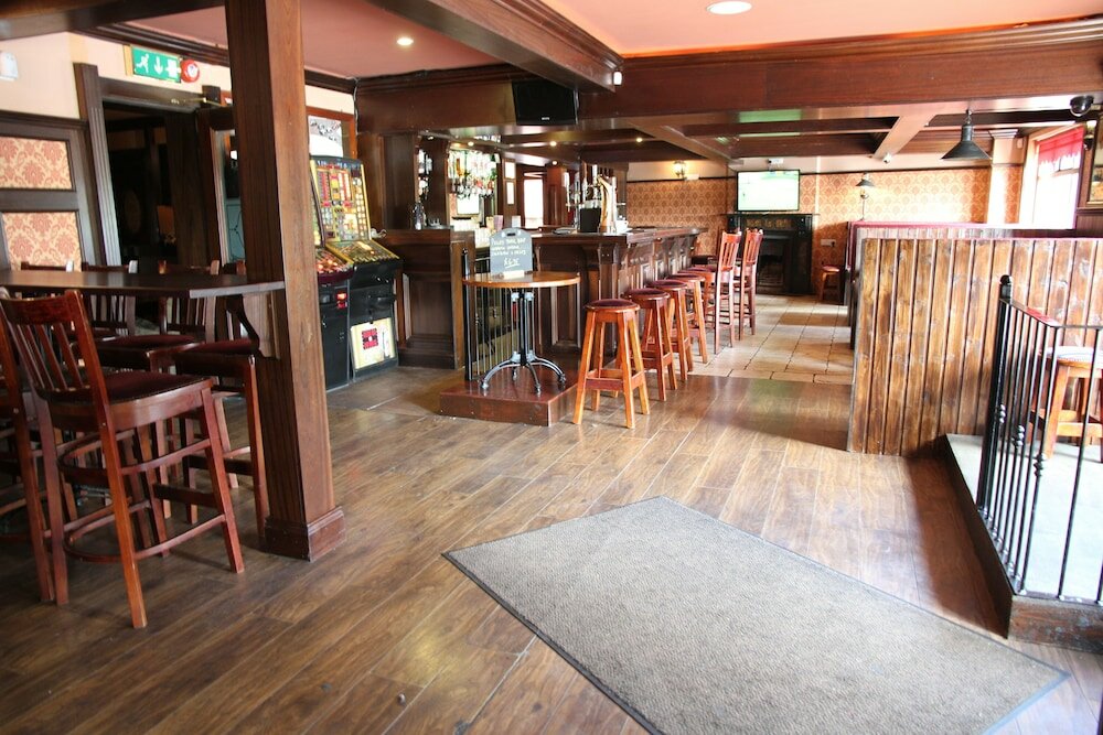 Фото 5 Corners Guest Inn