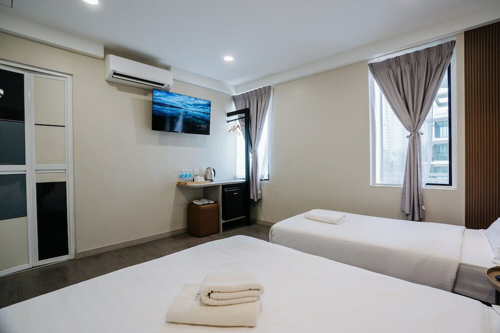 Фото Wang's Hotel Gurney Drive