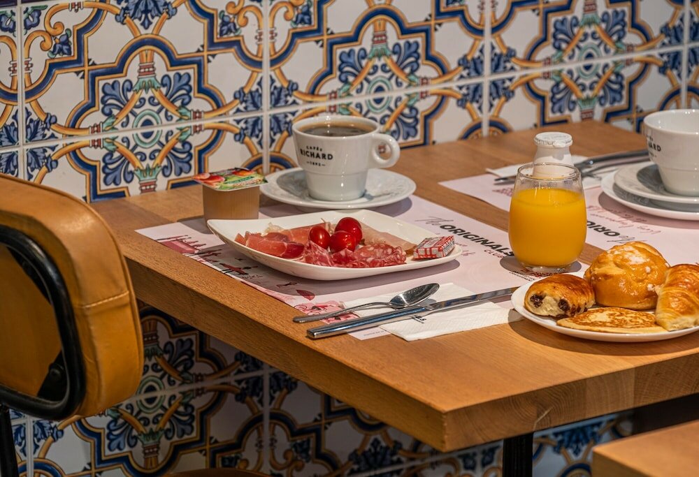 Фото The Originals Boutique, Hôtel Le Marignan, Le Havre Centre Gare